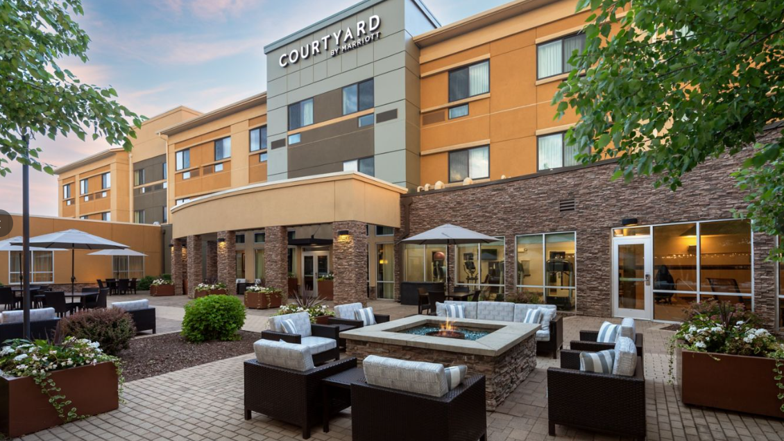 Courtyard by Marriott Mankato outdoor patio with fireplace and lounge seating