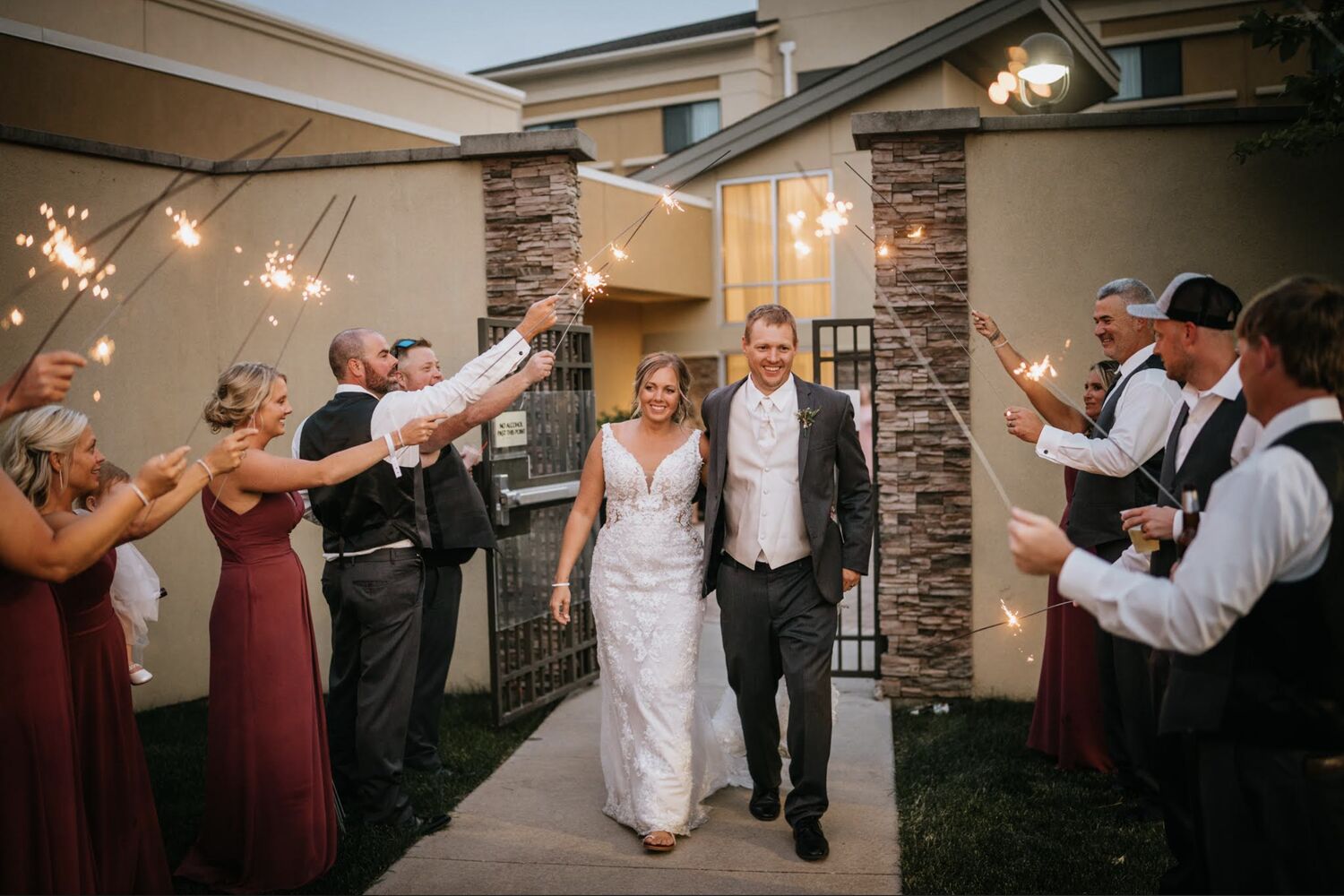 Wedding sparkler send-off outside the hotel entrance